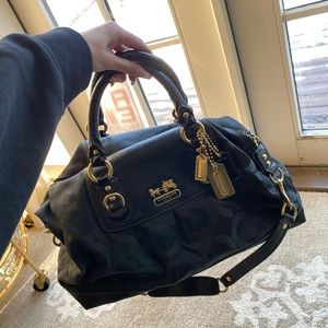 Coach black and gold monogram top handle  purse